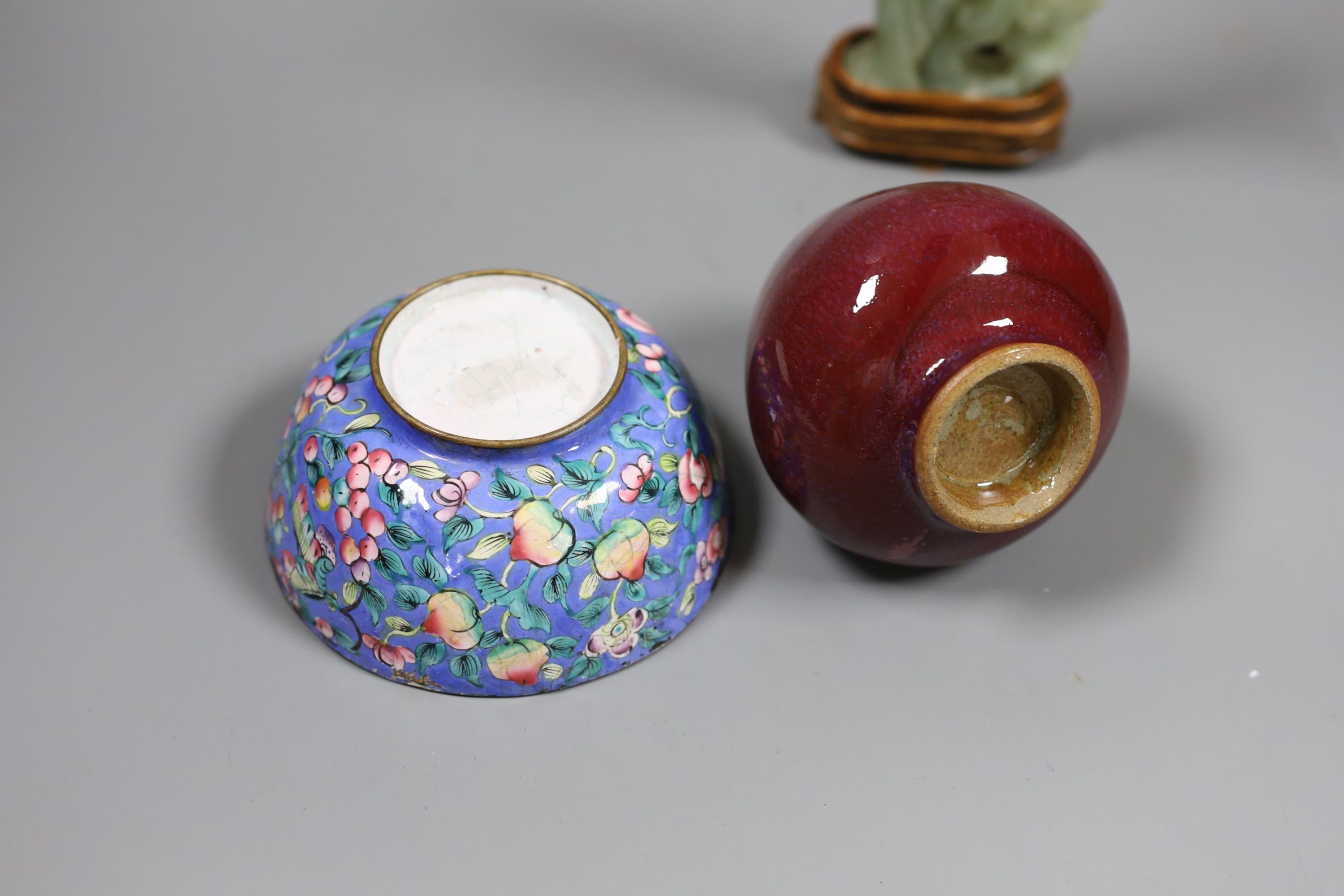 A Chinese bowenite jade figure of a lady, a Canton enamel bowl and a Jun type bud vase, tallest 20 cm high